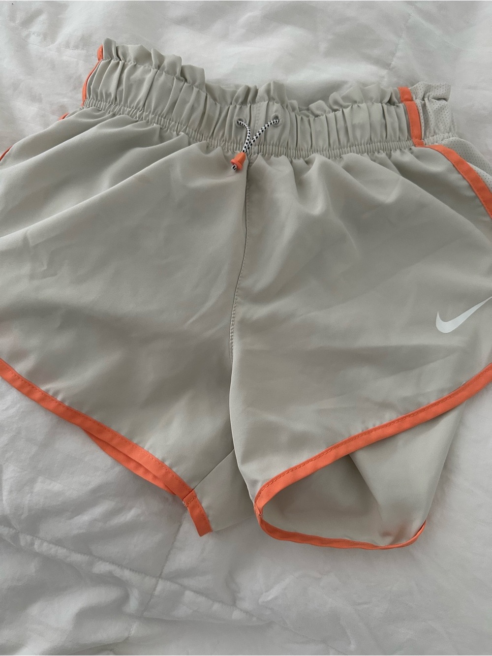 Nike Women’s Light Gray Athletic Shorts with Coral Edge